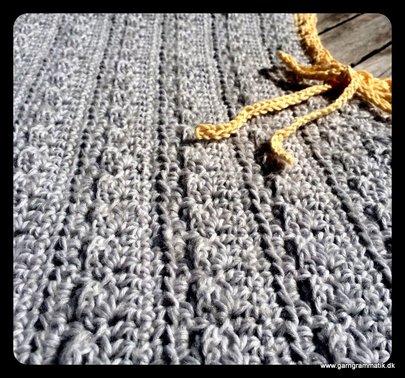 Poncho med bindebånd (2-8 år)