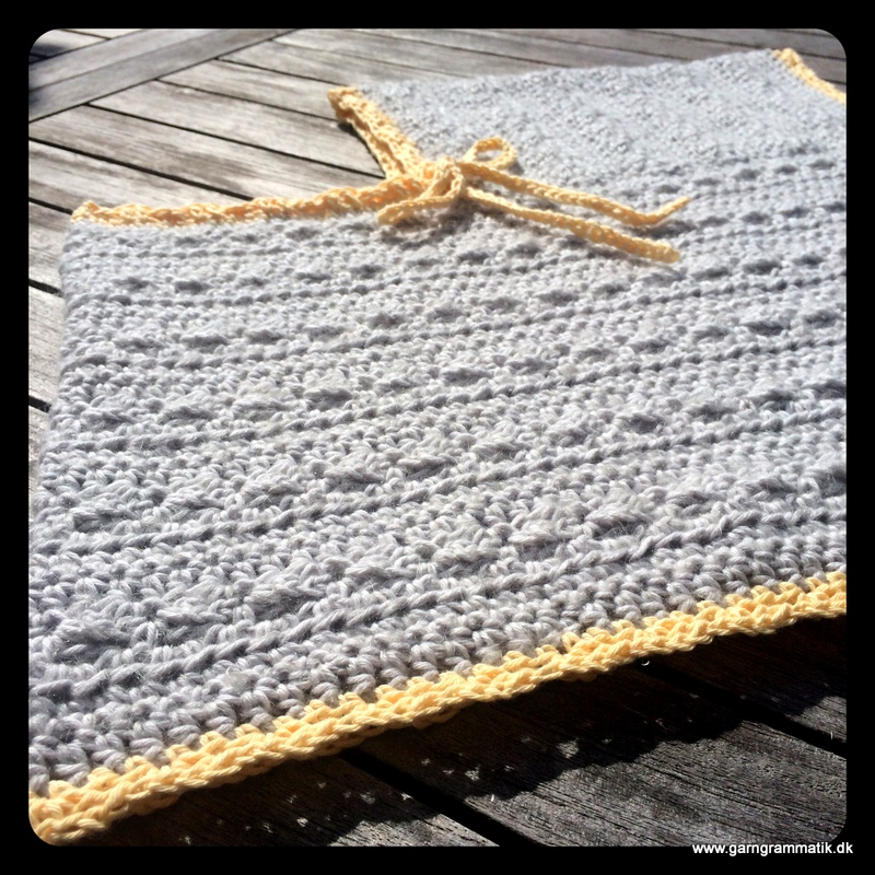 Poncho med bindebånd (2-8 år)