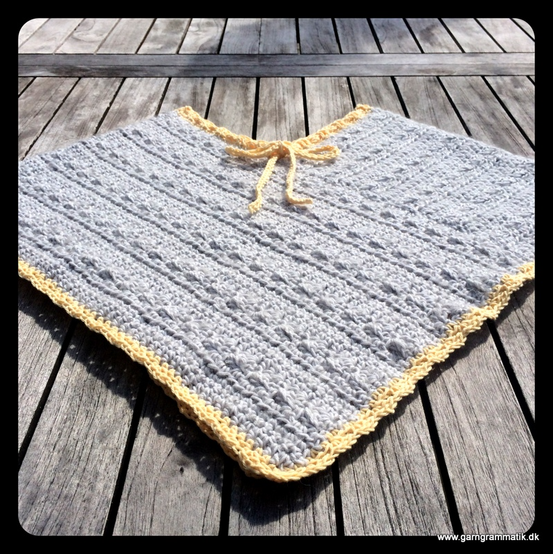 Poncho med bindebånd (2-8 år)