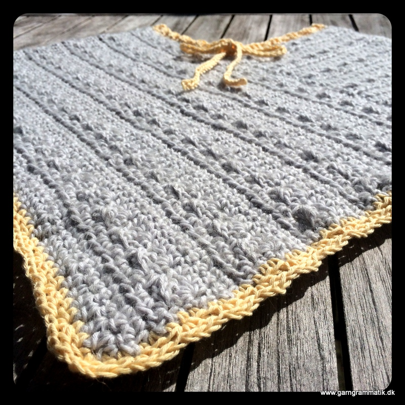 Poncho med bindebånd (2-8 år)